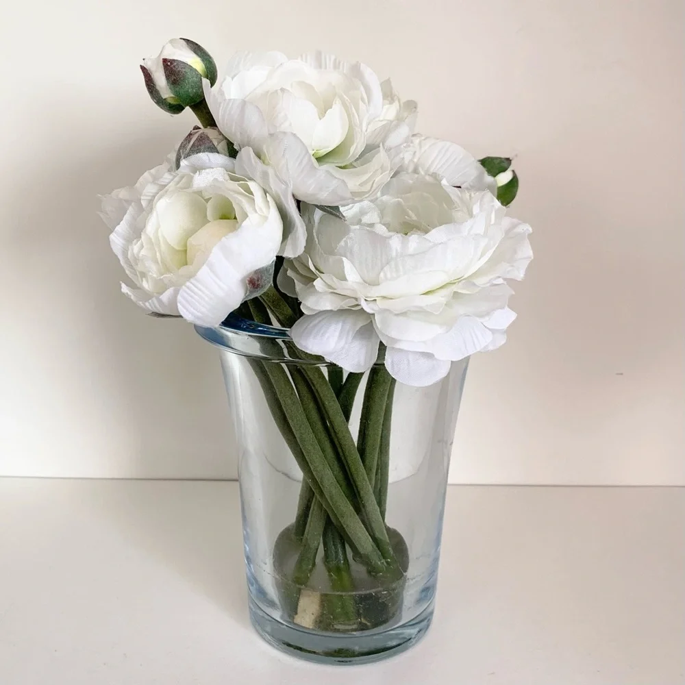 Thomas O’Brien Faux flowers in blue glass vase